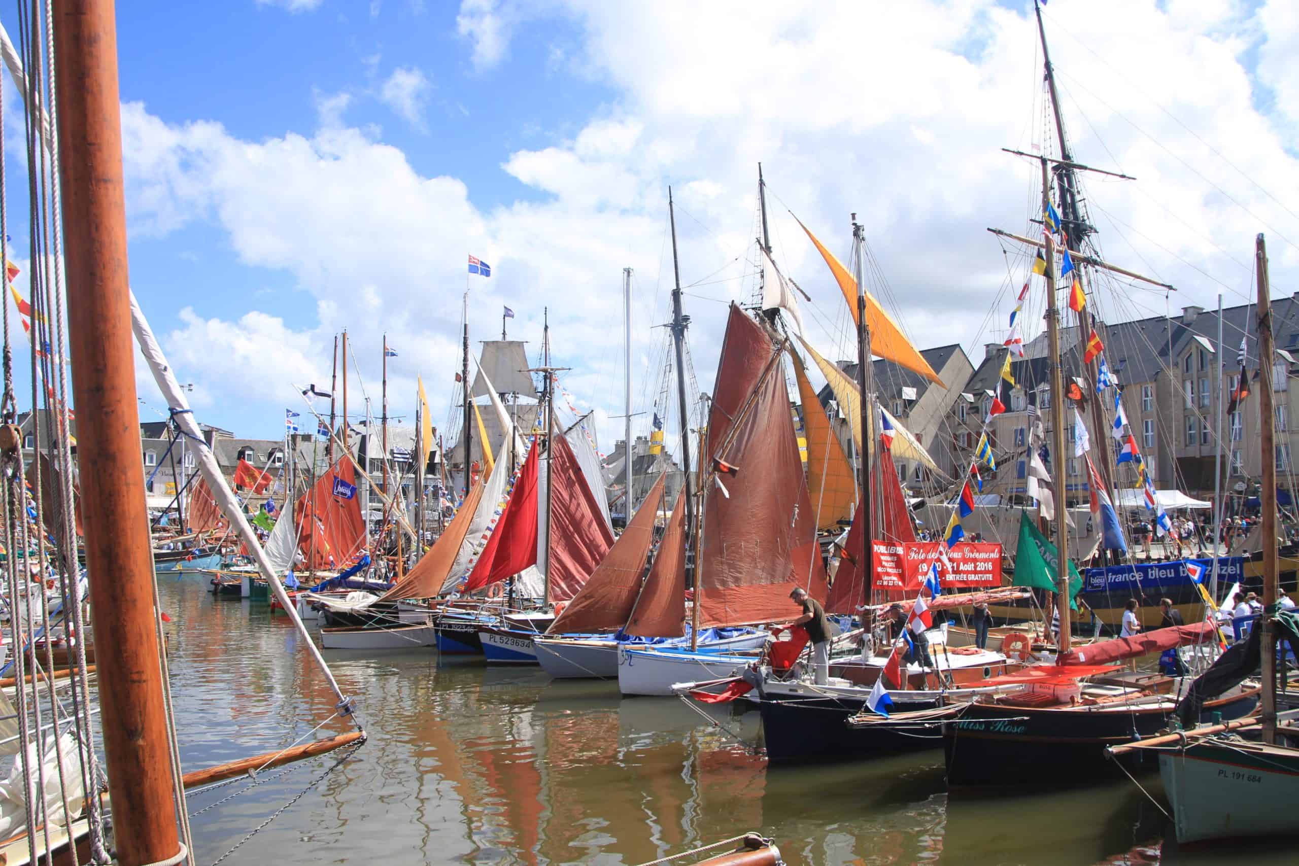 climbing up the over hanging futtock shrouds sail to a French maritime Festival
