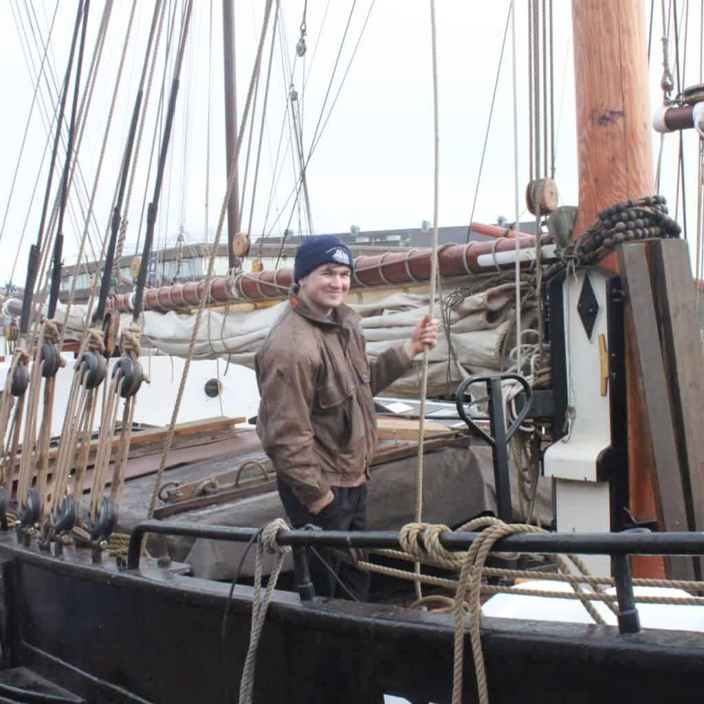 Crew on deck of sail cargo ship De Tukker