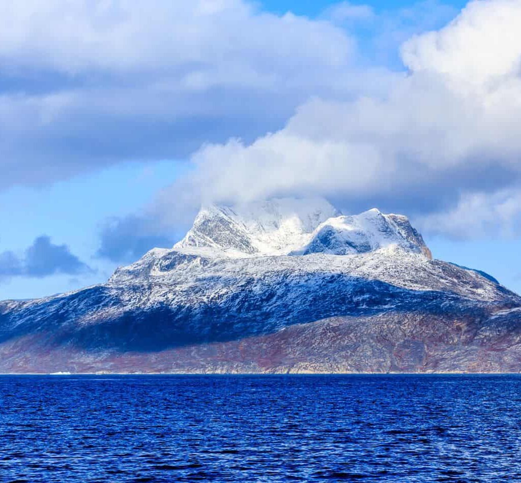 A mountain near Nuuk, Greenland, viewed from the sea. you can sail there with Classic Sailing